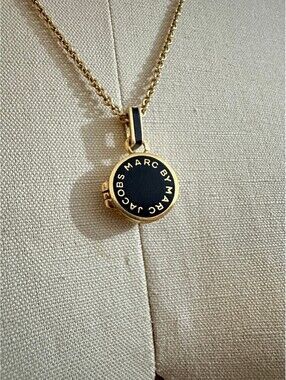 MARC BY MARC JACOBS Gold and Black Round Pendant Locket